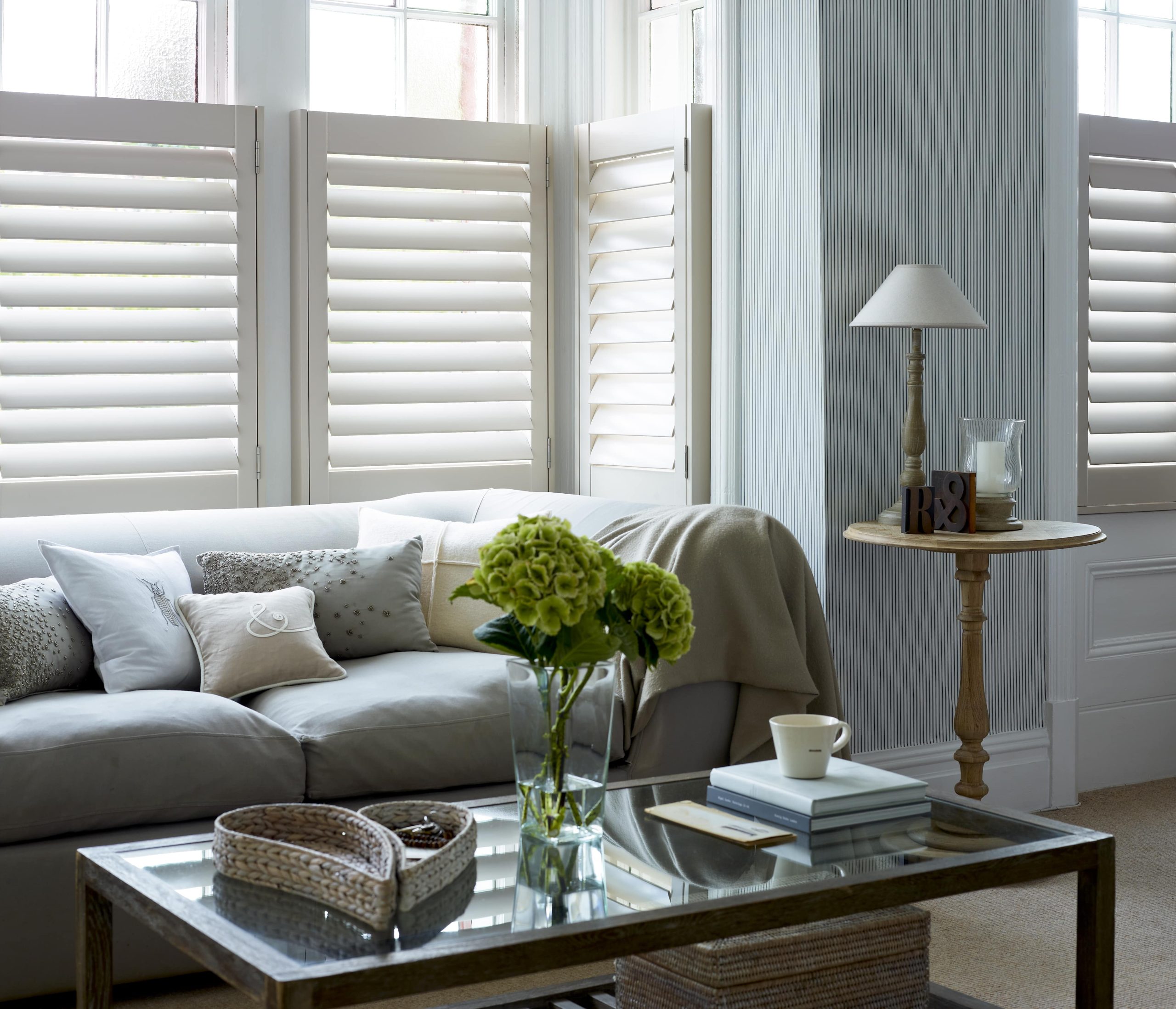 Cafe style living room shutters hybrawood-min Full height shutters in white