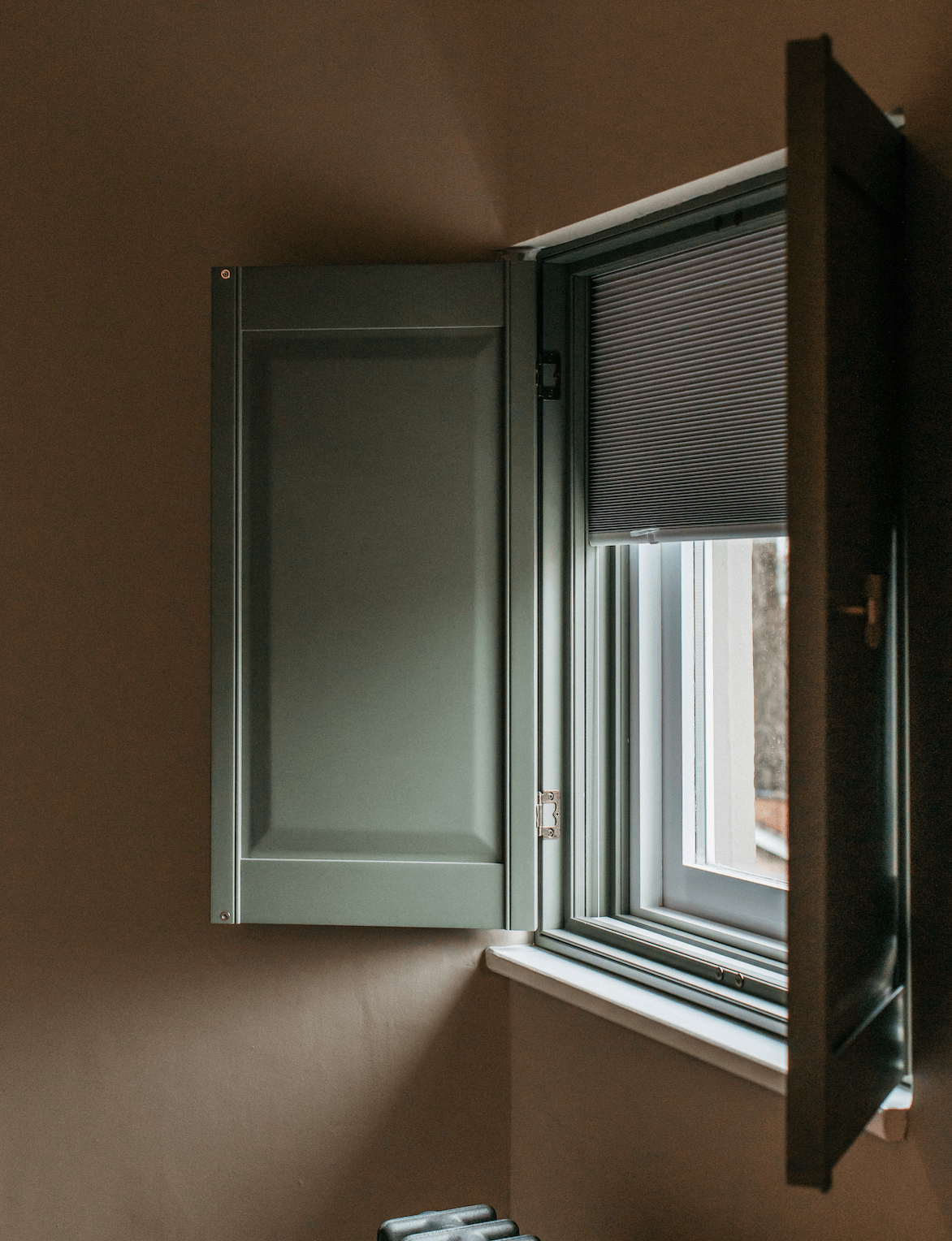 Solid raised shutters, panels open. Blinds down-min (1) Solid raised shutters, panels open. Blinds down-min (1)
